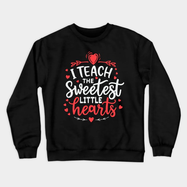 I Teach The Sweetest Little Hearts Valentines Day Teachers Crewneck Sweatshirt by jadolomadolo